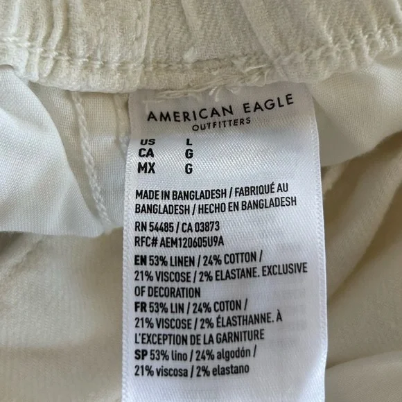 American Eagle Outfitters Ruffle Hem Cream Shorts - Picture 8 of 8